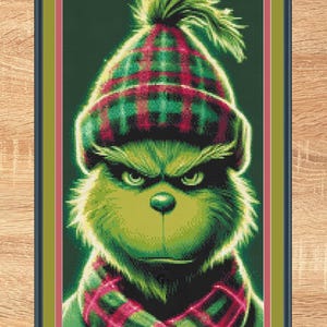 El Grinch. Punto de cruz mediano, compatible con Pattern Keeper/Markup. Hilos DMC. Descarga en PDF.