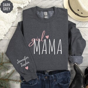 a shirt that says girl mama with hearts on it