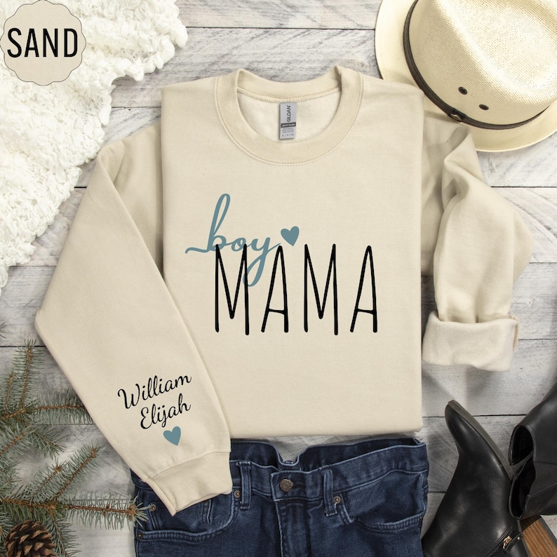 a sweater that says happy mama with hearts on it