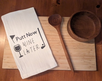Paño de cocina divertido con temática de vino y golf
