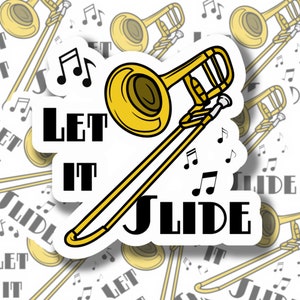 May include: A white sticker featuring a gold trombone and the text "Let It Slide" in black. Musical notes are scattered around the trombone.