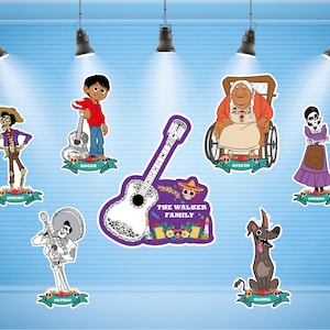 May include: A set of colorful stickers featuring characters from the animated film Coco. The stickers feature a guitar, a dog, and several skeletons. The text "The Walker Family" is printed on the guitar sticker.