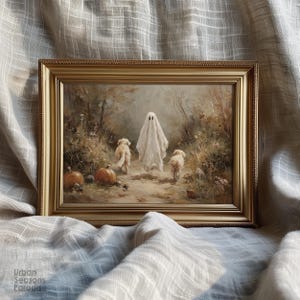 May include: A rectangular gold-toned frame containing a painting of a white ghost figure walking on a path through a wooded area with two light-coloured dogs and two orange pumpkins. The text Urban Seasons Paradise is printed in the bottom left corner.