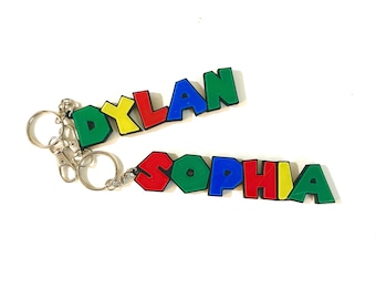 Personalized Mario style name keychains. Ideal gift for gamers or kids. Perfect for your keys or backpack or to keep as a conversation piece