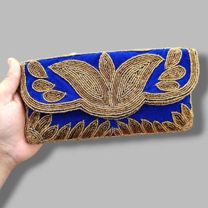 Gold Beaded blue velvet clutch with braided shoulder strap
