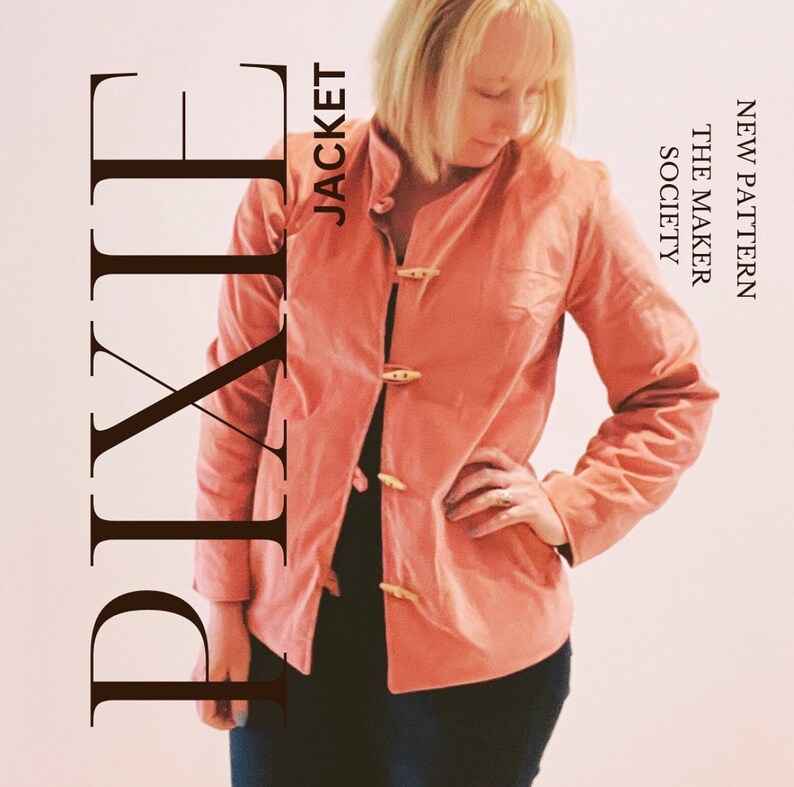 May include: A pink jacket with wooden toggle closures. The text "NEW PATTERN THE MAKER SOCIETY" is visible on the right side of the image. The text "JACKET" is visible on the left side of the image. The text "PIXIE" is visible in the lower left corner of the image.