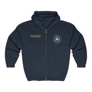 May include: Navy blue zip-up hoodie. The left chest features the text "PROGRAMMER Code Monkey" in gold. A white circular graphic with text is on the right chest. The hoodie has a full zipper and a hood.