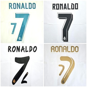 May include: Four different versions of a football shirt number. The number is 7 and the name RONALDO is printed above the number. The numbers are in teal, black, black with a white outline, and gold.