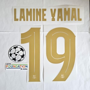 May include: Gold-coloured iron-on numbers "19" and the name "LAMINE YAMAL" for a football shirt. The UEFA Foundation for Children logo is also included.