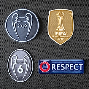 Liverpool Champions League-set med märken Fotboll 2019-2020