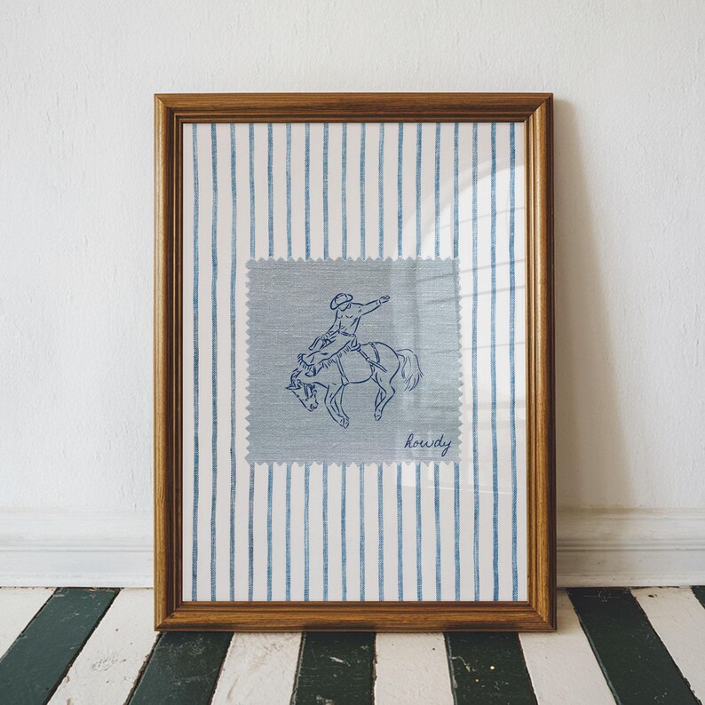 Add a bold statement to your space with this vintage striped rodeo print. Featuring retro blue and white stripes with a rustic western vibe, this cowboy poster is perfect for adding western bedroom wall art flair. The charming retro horse print blends seamlessly into rustic mid century modern home decor styles and makes a cute accent for dorm decor. Ideal for rodeo lovers, cowboy fans, and anyone who loves unique vintage western style.