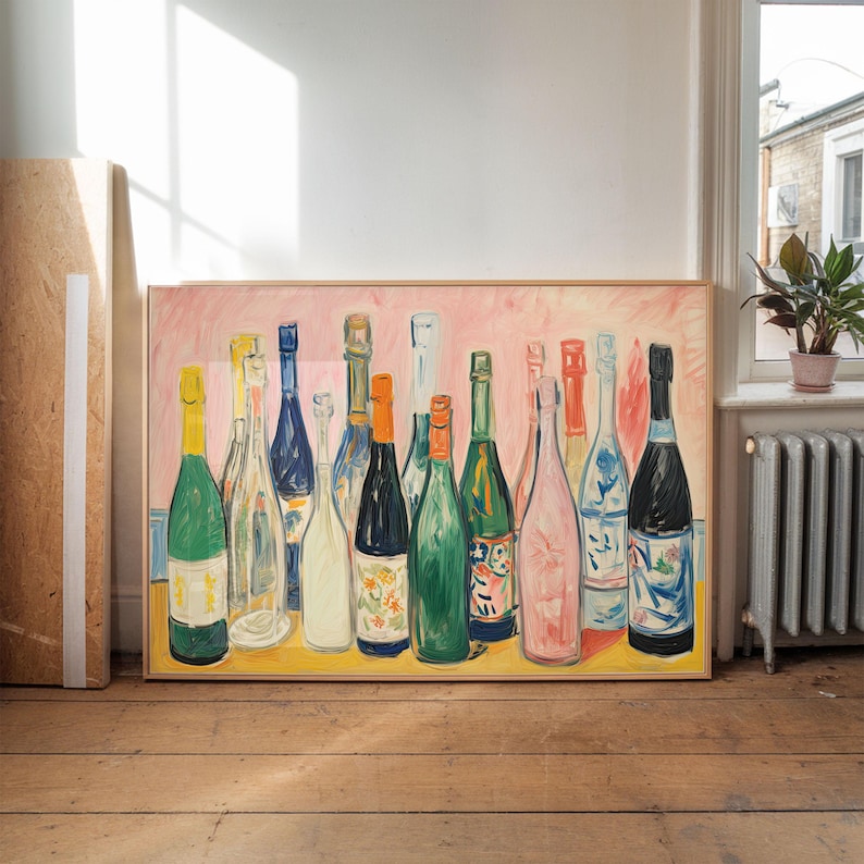 May include: A framed painting featuring a collection of wine and champagne bottles. The bottles are depicted in various colors, including green, blue, and pink, against a pink background. The painting is displayed on a wooden floor.
