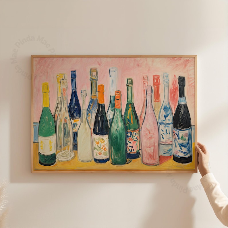 May include: A framed painting featuring a collection of wine bottles in various colors and designs. The bottles are arranged on a yellow surface against a pink background. The artwork is in a wooden frame.