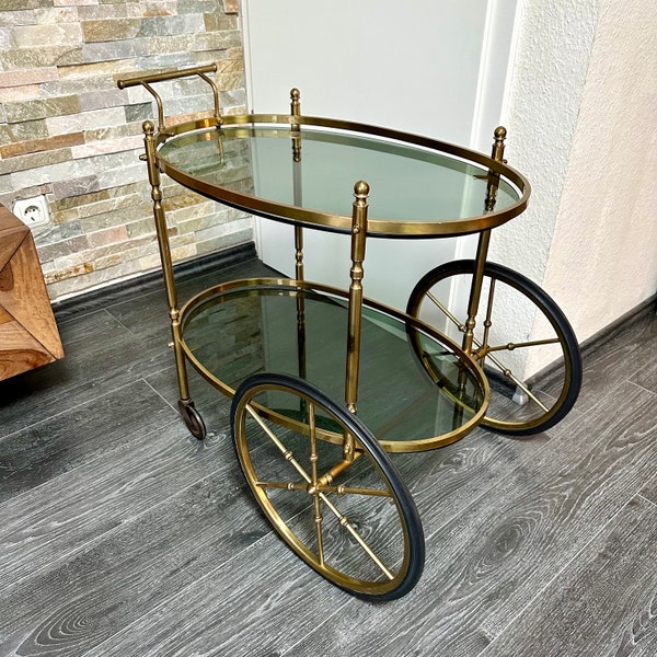 Serving trolley French bar trolley made of brass MidCentry trolley with smoke glass plates rolling side table vintage oval
