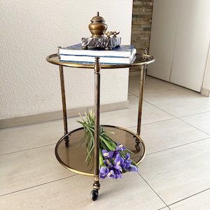 Vintage bar cart brass round serving cart on wheels with tinted glass small rolling side table antique mid-century style interior