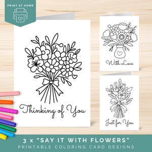 May include: Three printable coloring card designs featuring floral bouquets. One card says "Thinking of You", another says "With Love", and the third says "Just for You". The cards are black and white line drawings. The text "3 x SAY IT WITH FLOWERS PRINTABLE COLORING CARD DESIGNS" is at the bottom.