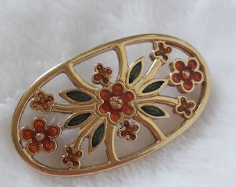 Vintage gold tone and enamel flower brooch