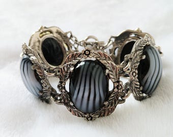 Vintage silver tone panel bracelet with blue striped glass