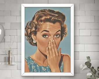 May include: A framed vintage poster featuring a woman with a surprised expression, covering her mouth with her hand. The woman is wearing a blue and white floral dress and has blonde hair. The poster is in a white frame and is hanging on a white tiled wall.