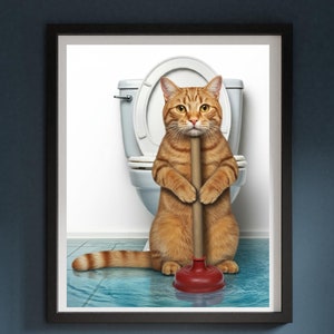 May include: A ginger cat sits on a toilet bowl holding a plunger. The cat is looking at the camera. The toilet is white and the plunger is red.
