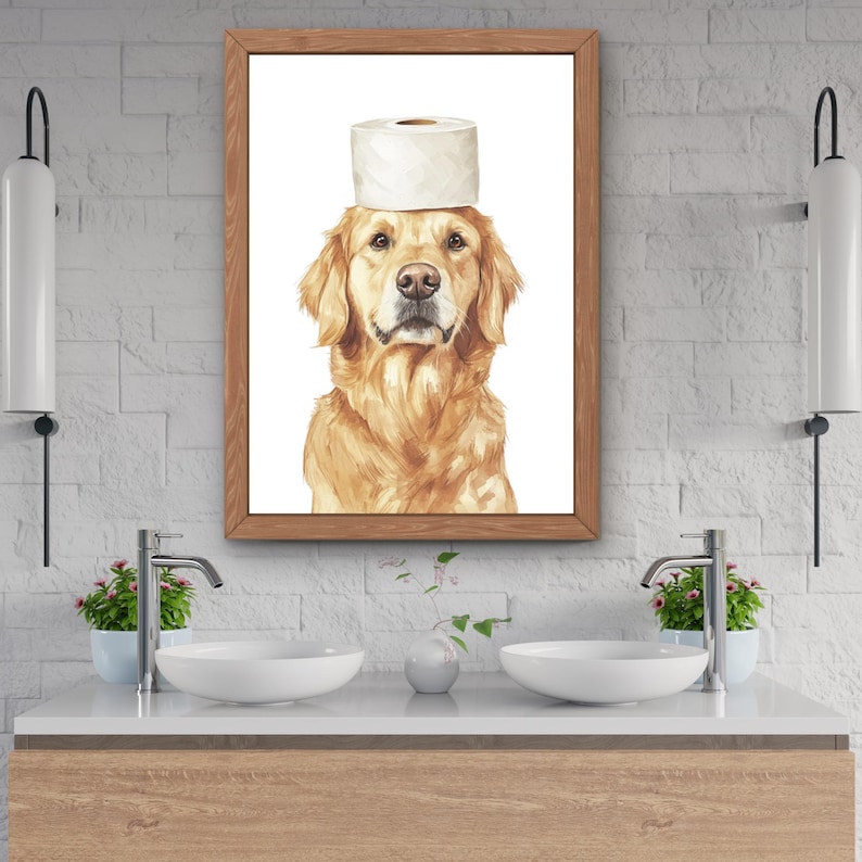 May include: A framed watercolor painting of a golden retriever with a toilet paper roll on its head. The dog is looking directly at the viewer. The painting is set against a white background.