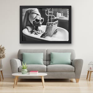 May include: A black and white photo of an alien in a bathtub reading a newspaper that says "UFO NEWS". The alien is wearing a towel on their head and sunglasses.