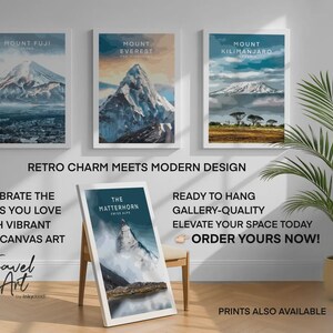 The image is an advertisement for a travel art gallery, featuring three framed landscape paintings of mountains and a potted plant on a white wall.