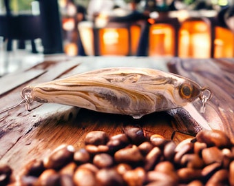 Bienvenue dans le monde du "Café Crême," le Phoxy baby Minnow conçu artisanalement avec passion pour la pêche à la truite!