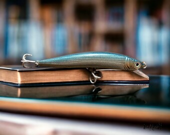 Handcrafted pike jerkbait. Realistic imitation of a bleak.
