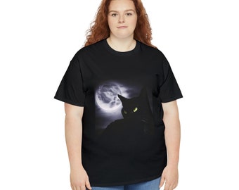 May include: A black t-shirt featuring a graphic of a black cat gazing at a full moon. The moon is white and grey with clouds surrounding it.