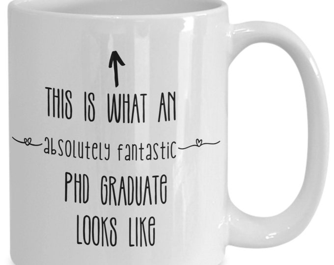 PhD graduation gift mug for her, This is what an absolutely fantastic PhD graduate looks like mug for her