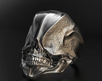 Anello con teschio che ride in argento sterling