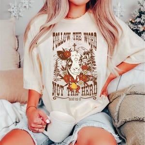 Follow The Word Not The Herd Shirt, Isaiah 8:11-13 Shirt, Bible Verse Tshirt, Cow Lover Shirt, Western Cowboy Tees, Western Cow Shirts