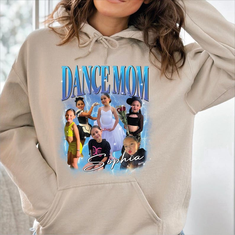 a woman wearing a tan dance mom hoodie