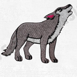 May include: Embroidered patch of a howling wolf. The wolf is rendered in grey tones with white detailing on its chest and a pink ear. The patch is created with detailed stitching, giving it a textured look. The wolf is in profile, with its head raised in a howl.