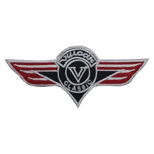 May include: Embroidered patch with a wing design. The patch features a black and white circular emblem with the word "Classic" and a "V" inside. The wings are red and black with white accents. The text "Vulcan" is arched above the emblem.