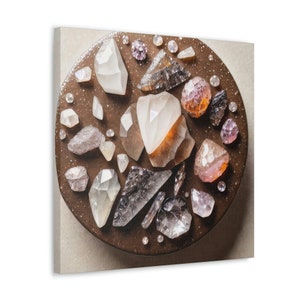 May include: A collection of various sizes and shapes of clear, pink, and brown crystals arranged on a brown circular surface.