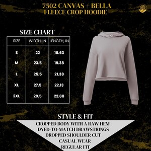 May include: Size chart for a cropped fleece hoodie with a raw hem, dyed-to-match drawstrings, and dropped shoulders. The hoodie is available in sizes S, M, L, XL, and 2XL. The chart shows the width and length of each size in inches.