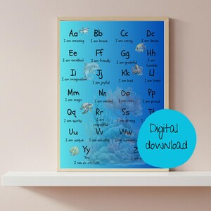 May include: A framed educational poster with a blue gradient background features the alphabet, each letter paired with a positive affirmation. The poster includes sea creature illustrations and a blue circle with the words "Digital download".