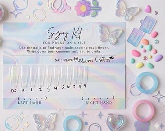 May include: A press-on nail sizing kit on a holographic card with the text Sizing Kit, Nail Shape: Medium Coffin, and labels for left and right hands. It includes eleven clear, coffin-shaped nail tips numbered 00 through 9, plus decorative butterfly, heart, and ring charms.