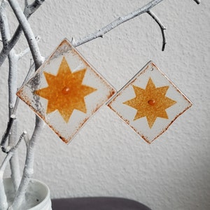 kleine Sonnenfänger, Geschenkanhänger aus Glas Sternepaar orange