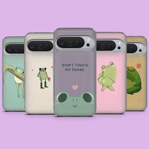 May include: A collection of phone cases with frog designs. Each case features a different frog illustration, including a frog on a branch, a frog with a hat, a frog with the text "DON'T TOUCH MY PHONE", and a frog with a heart.