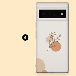 May include: White phone case with a brown and white abstract floral design. The design features a lily flower with leaves and stems.