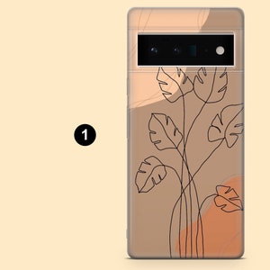 May include: A phone case with a minimalist design featuring a brown background and black line drawings of leaves. The case has a camera cutout with a black border.