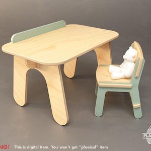 May include: A light wood children's table and chair set with a light green accent. A white teddy bear sits on the chair. The table has a light green accent on the back. The text in the image says "WARNING! This is digital item. You won't get "physical" item."