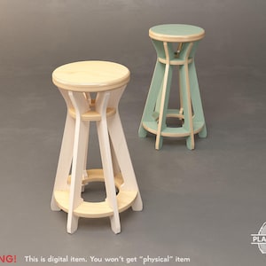 May include: Two wooden stools with a modern design. One is white with a natural wood seat, the other is mint green with a natural wood seat. The stools have a circular seat and a triangular base. The text "WARNING! This is digital item. You won't get "physical" item" is at the bottom.