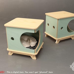 May include: Two wooden cat houses. Each has a light green frame with a natural wood top and base. One has a heart-shaped opening, the other a curved opening. A white cat figurine rests inside one. The text "WARNING! This is digital item. You won't get "physical" item" is at the bottom.