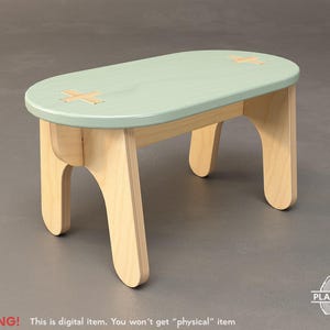 May include: A rustic wooden sign with the text "Welcome" in a handwritten style. The sign is painted white with a distressed finish, and features a decorative floral element in the corner. The background is a blurred image of a wooden surface.