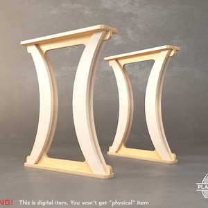 Può includere: Due gambe per tavolo in legno con un design curvo. Le gambe sono in legno chiaro e hanno una finitura naturale.