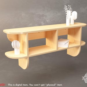 May include: A light-colored wooden shelf with three compartments and rounded edges. The shelf holds white decorative items and books. The text "WARNING! This is digital item. You won't get "physical" item" is at the bottom.